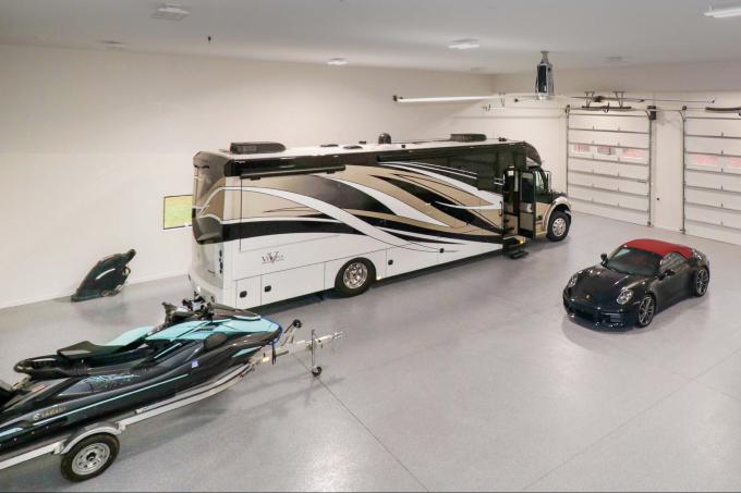 Garage View With Boat, Car, and RV